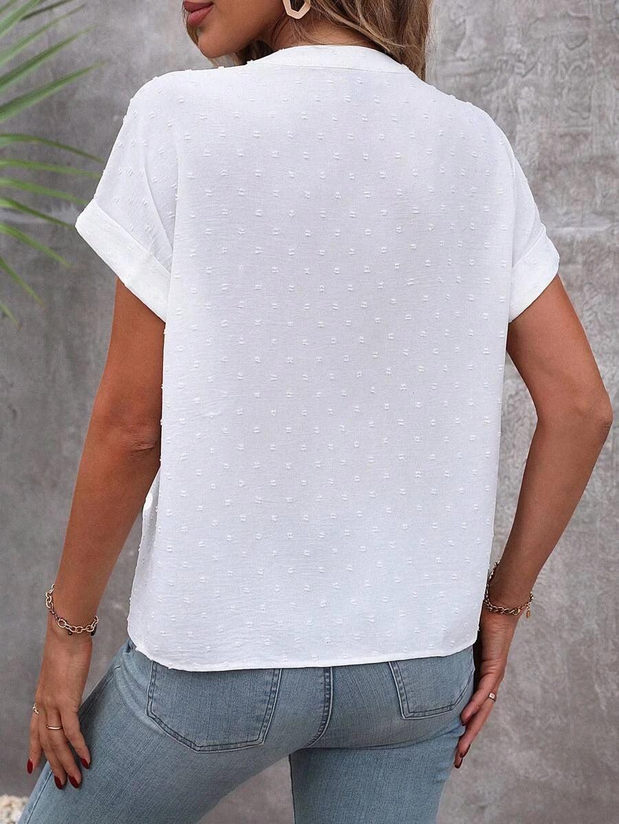 LEILANI | V-neck blouse with Swiss dot buttons