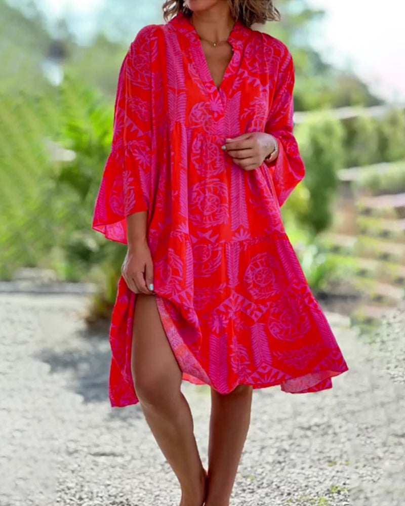 JOYCE | Flowy midi dress with bohemian print