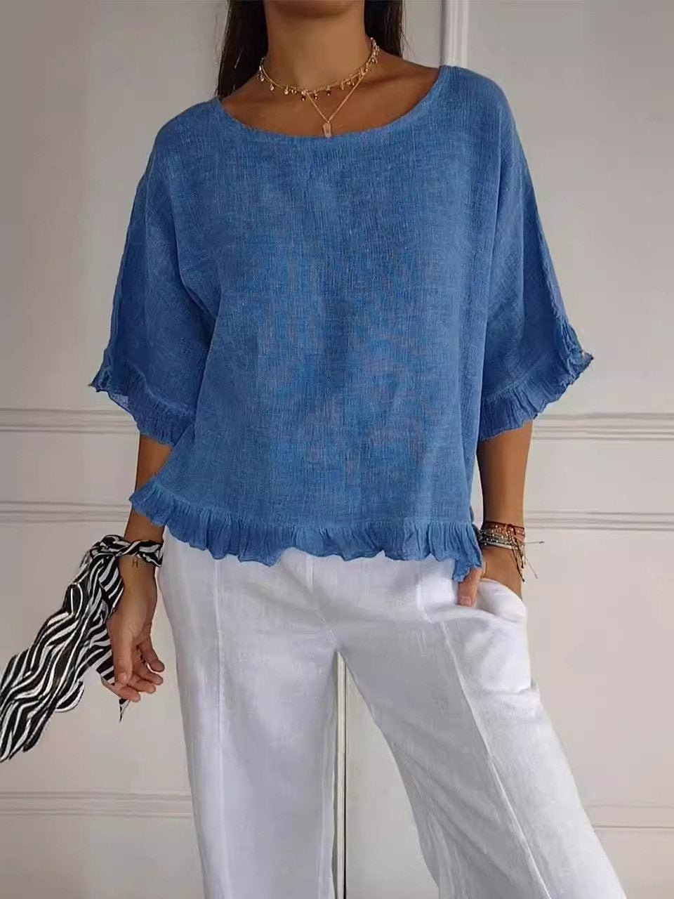 AMANDA | Ruffle-hem blouse with airy silhouette