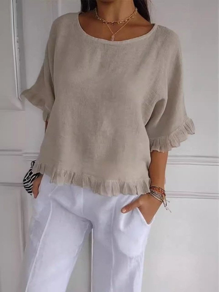 AMANDA | Ruffle-hem blouse with airy silhouette