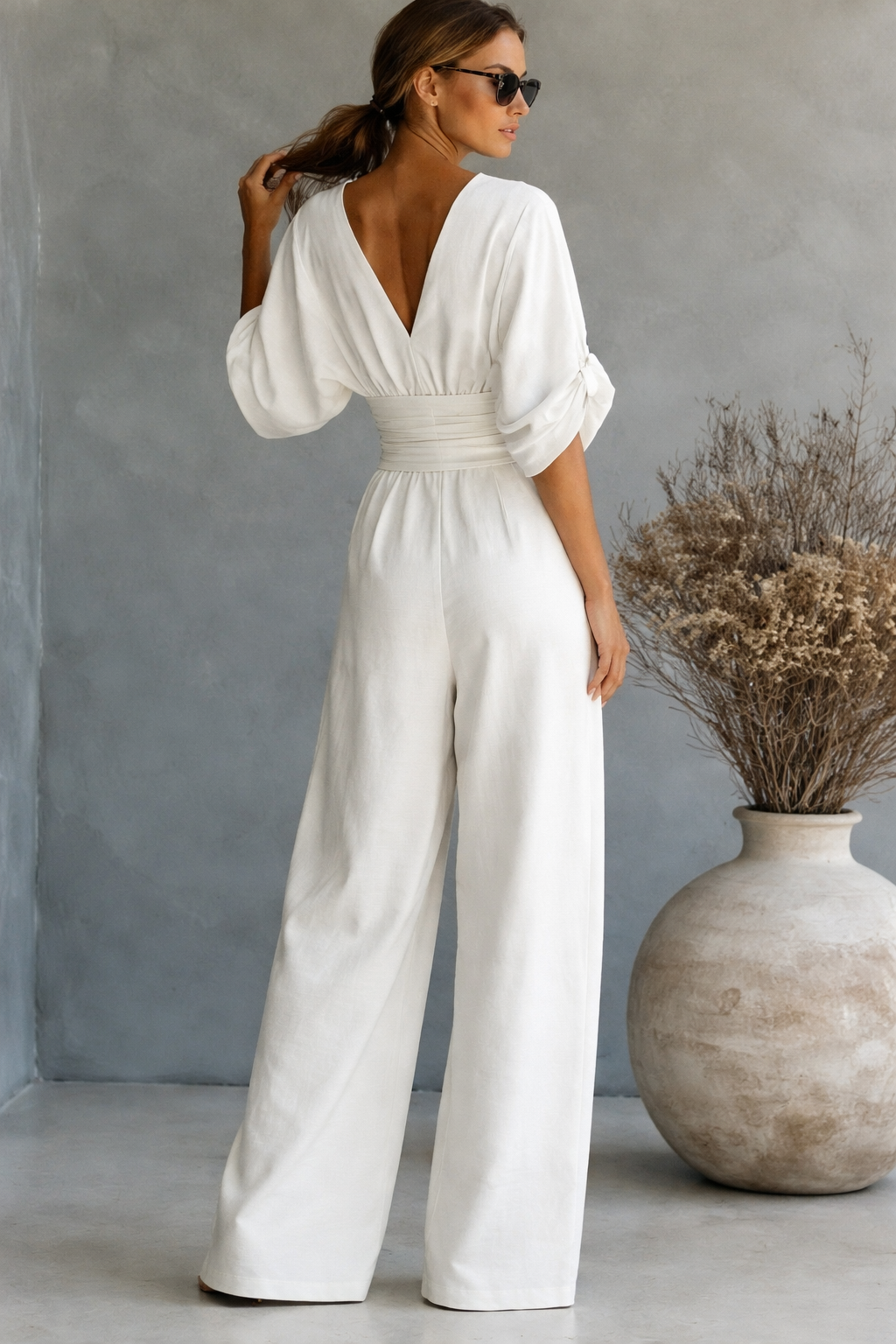 RISEL | Wide-leg jumpsuit with crossover V-neck