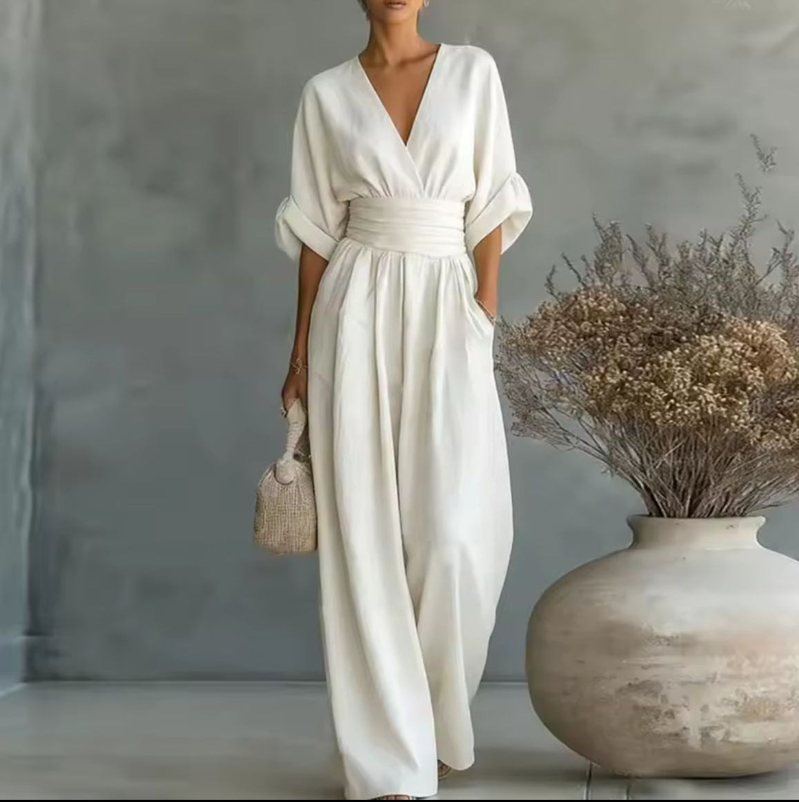 RISEL | Wide-leg jumpsuit with crossover V-neck