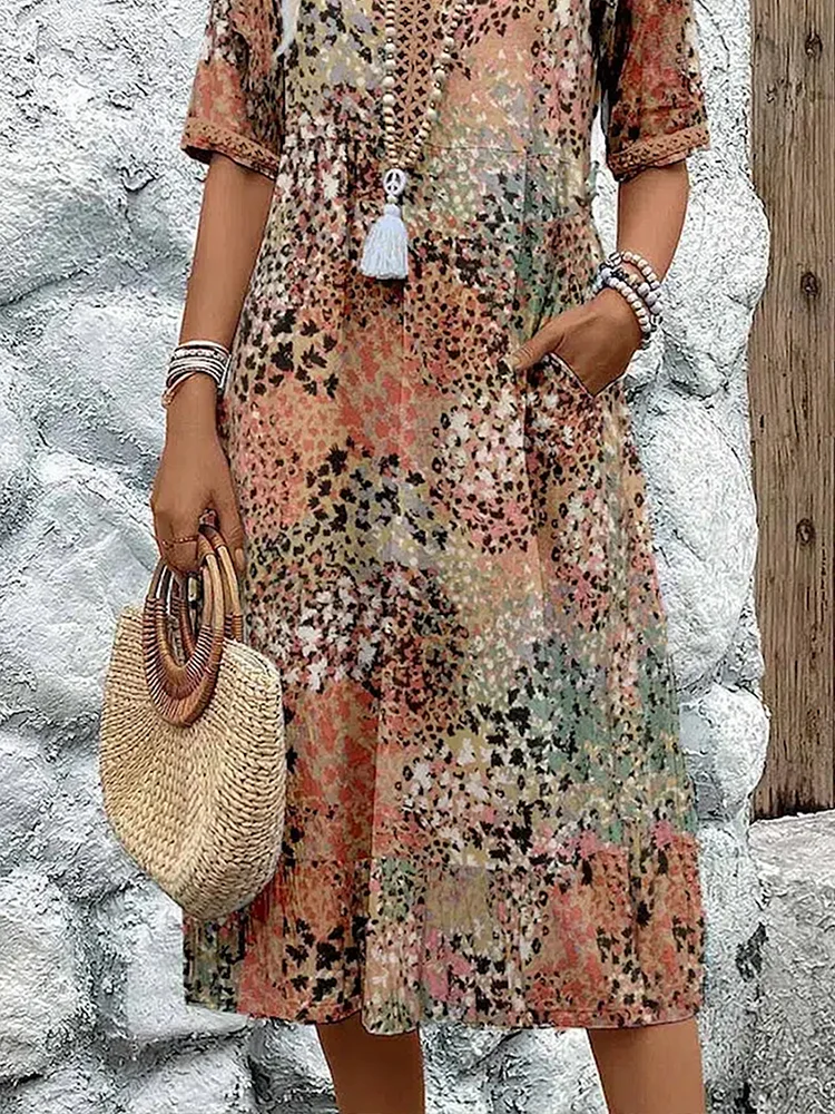 FLORENCIA | Sleeveless midi dress with vibrant print