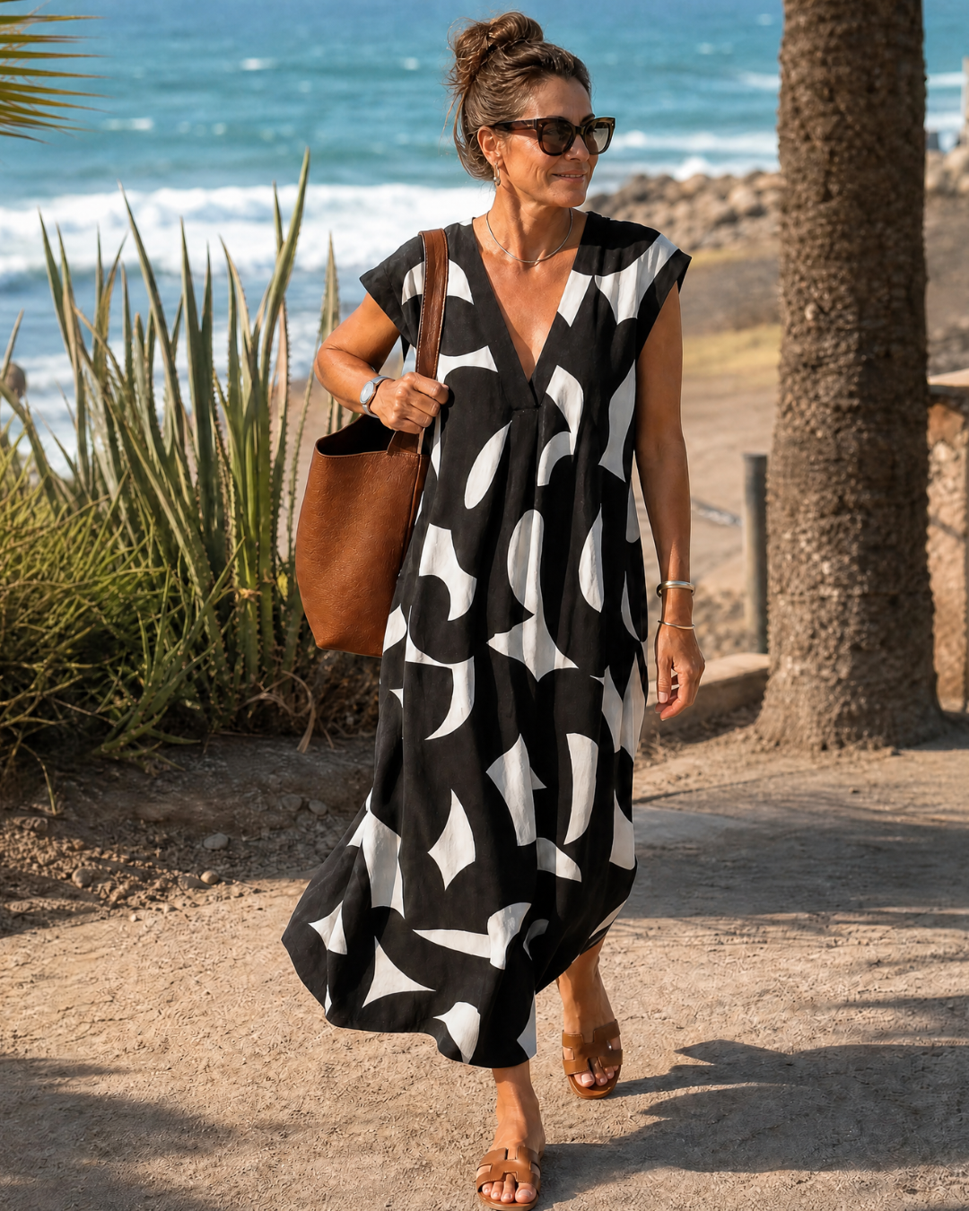 VERAIN | V-neck midi dress with abstract print