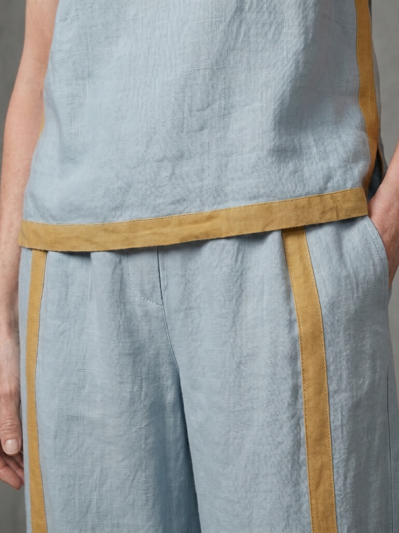 INARA | Sleeveless top with contrast-trim wide-leg pants