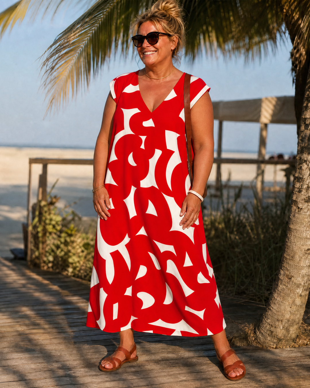 VERAIN | V-neck midi dress with abstract print