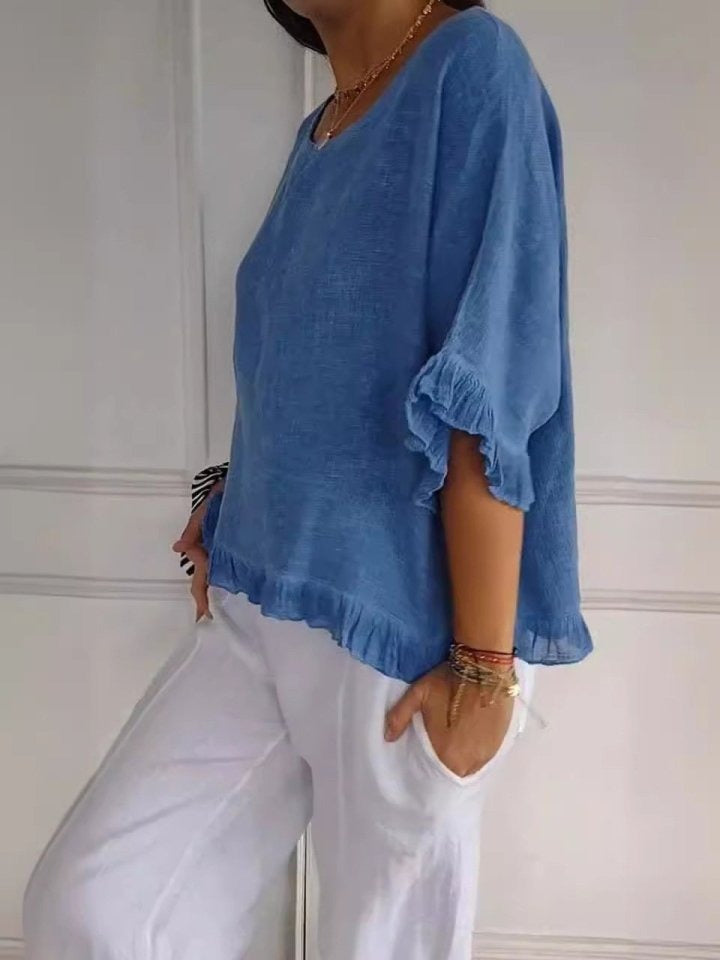 AMANDA | Ruffle-hem blouse with airy silhouette
