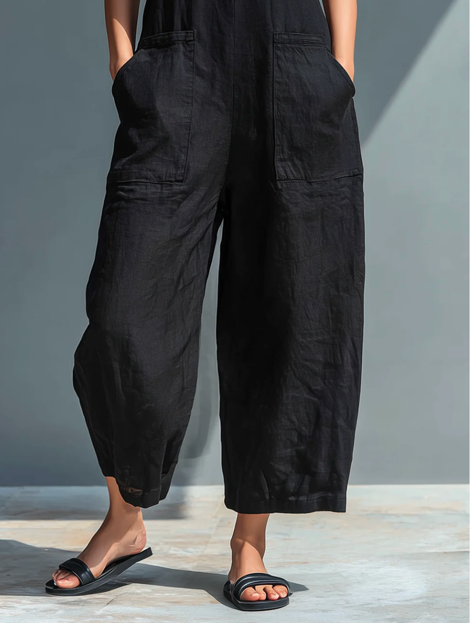 EDEN | Sleeveless jumpsuit with high collar