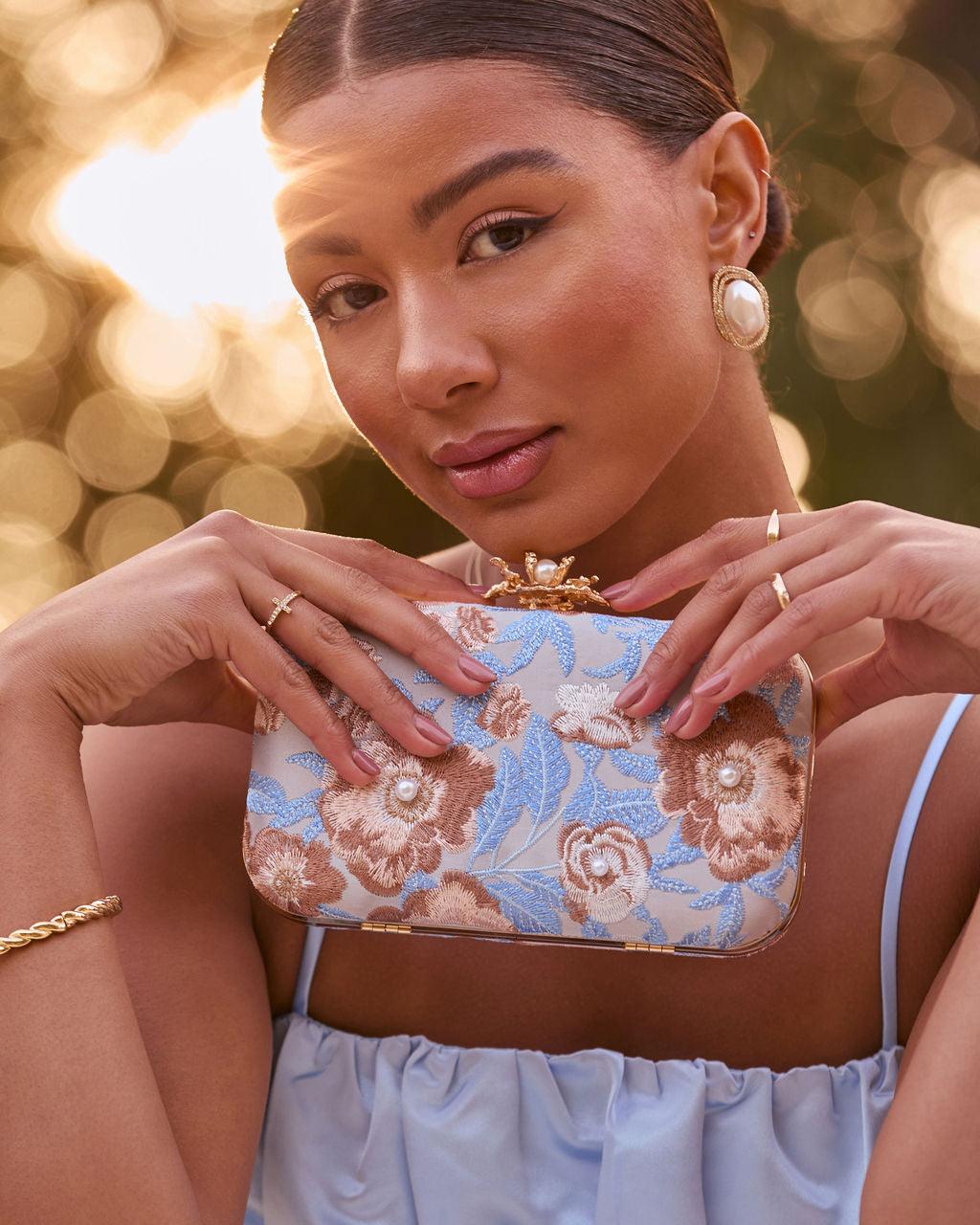 FRESIA | Floral embroidered clutch with top handle