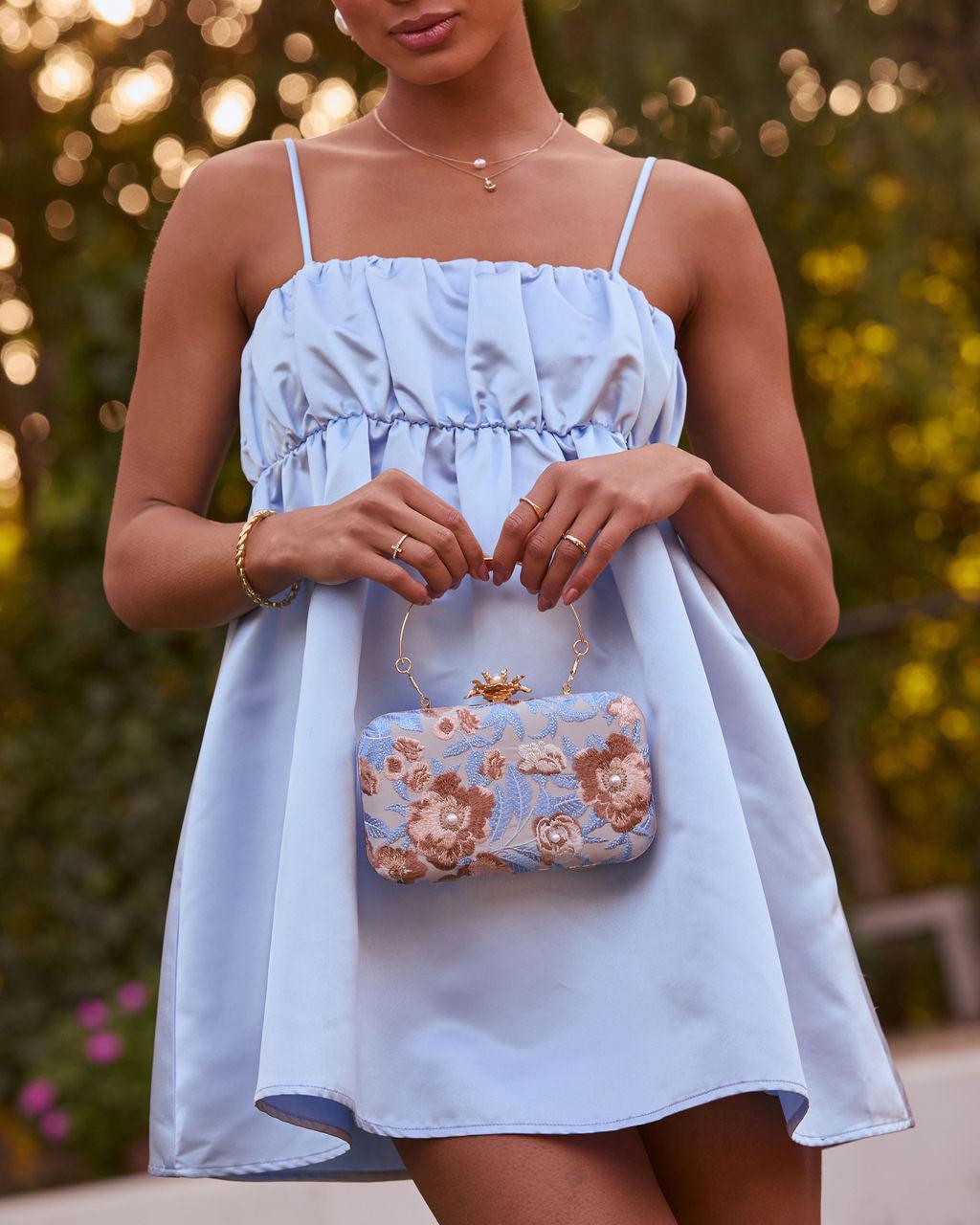 FRESIA | Floral embroidered clutch with top handle