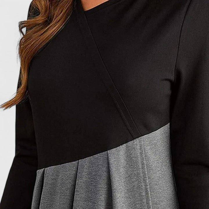 REVALINE | Sleeveless elegant dress with a flattering fit