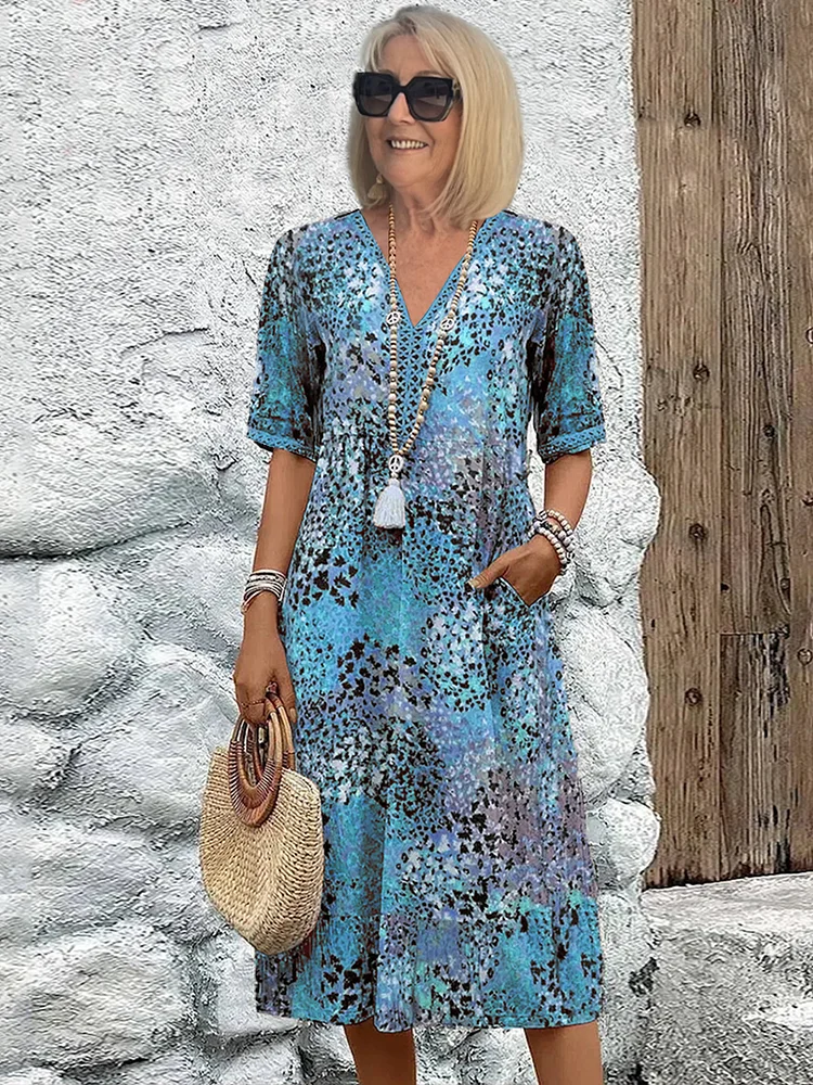 ROXANNE | Floral wrap midi dress with fluid drape