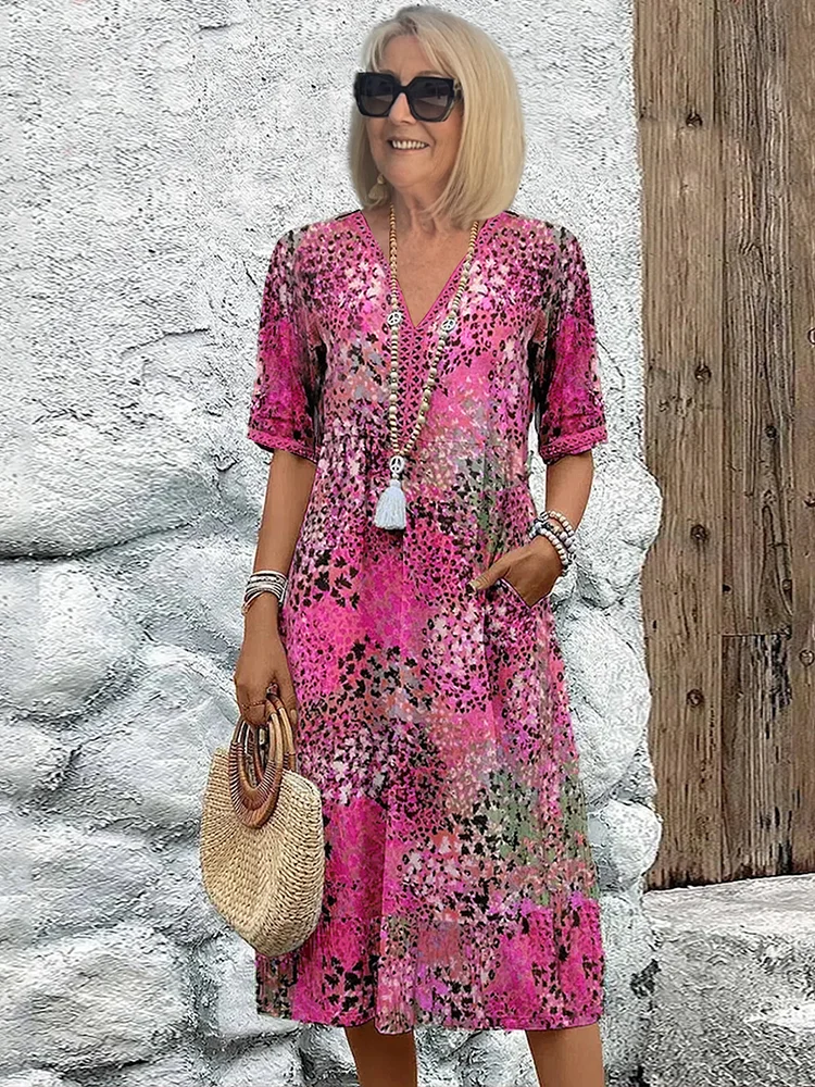 FLORENCIA | Sleeveless midi dress with vibrant print