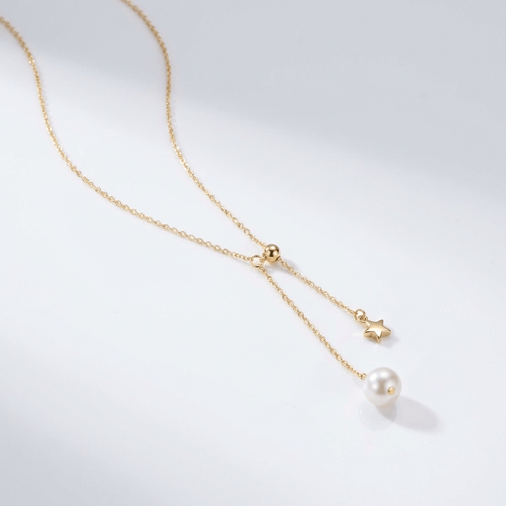 LUNA | Gold lariat necklace with pearl and star pendant
